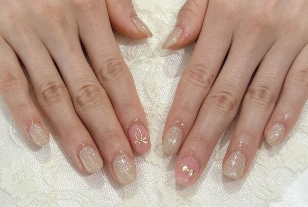 「ハンド 定額デザイン」コーラルとリボンの組み合わせが可愛い！|Nail Salon Linda
