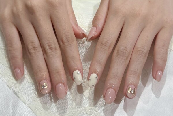 「ハンド 定額デザイン」ピンクとリボンの組み合わせでガーリーな仕上がりに！|Nail Salon Linda
