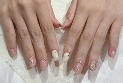 「ハンド 定額デザイン」ピンクとリボンの組み合わせでガーリーな仕上がりに！|Nail Salon Linda
