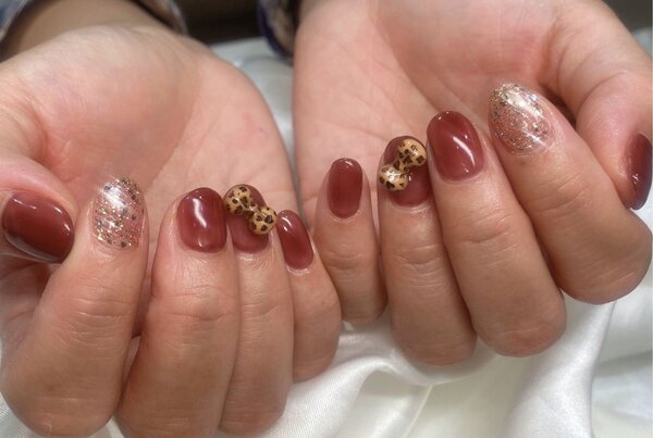 「ハンド 定額デザイン」ヒョウ柄のリボンがポイントです♪|Nail Salon Linda
